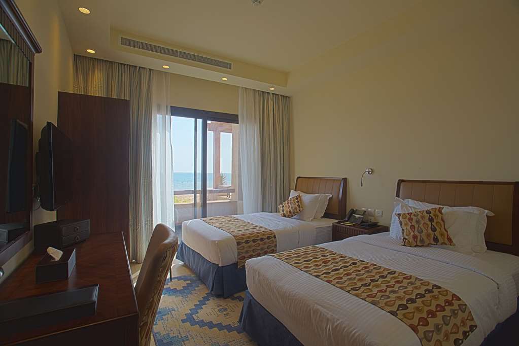 Golden Tulip Sharma Resort Room photo